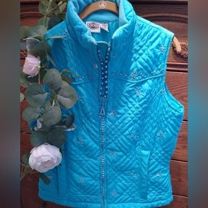 Super cute zip up vest with lots of sparkles, size medium.